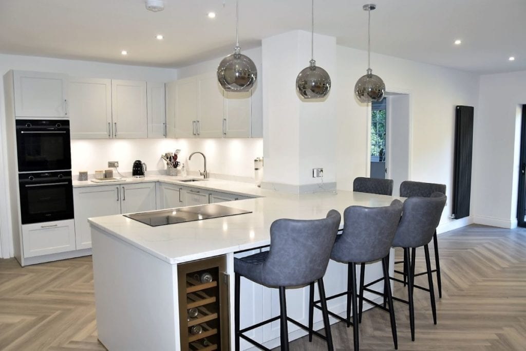 Kitchen utilising kitchen islands to create a functional space